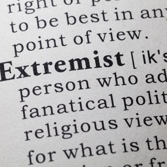 Dictionary page with partially visible
                      definition of EXTREMIST