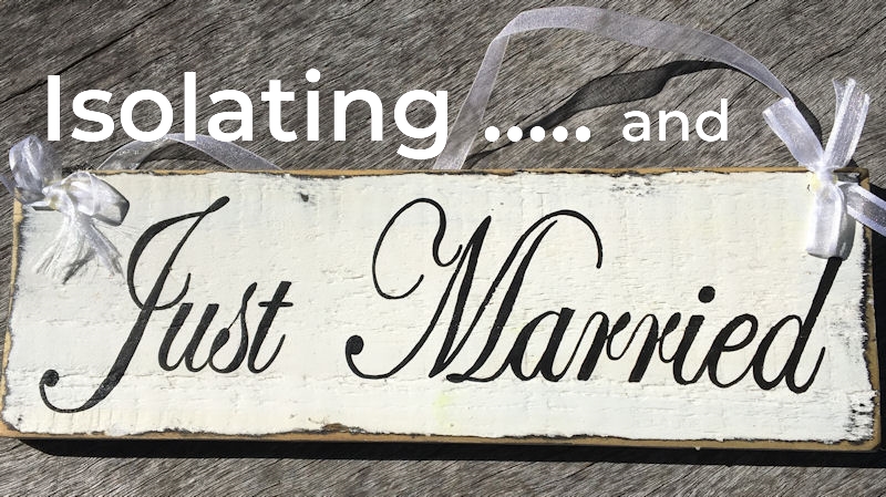 Rustic Just Married Sign on weathered grey
wood surface