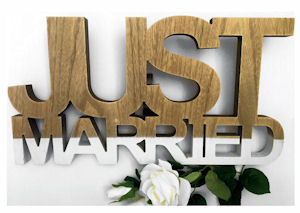 Just Married Cutout Sign with white
                            roses