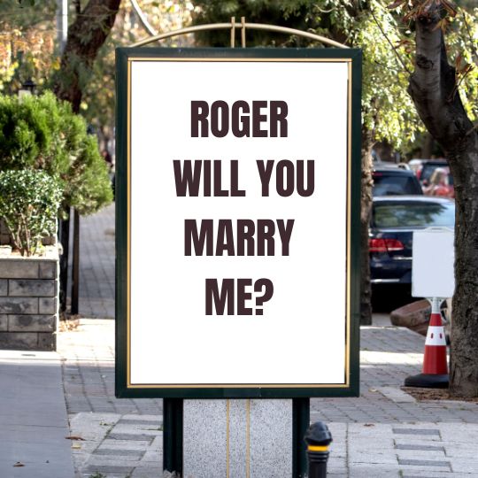 Billboard saying Roger, will you marry
                      me>