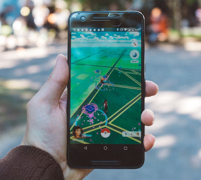 Person Playing Pokemon Go