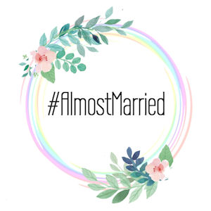 Floral circle with the word #almostmarried
                    in it