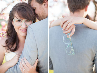 Bride wearing blue glasses with groom
wearing a pale blue suit
