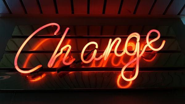 Neon sign reading Change