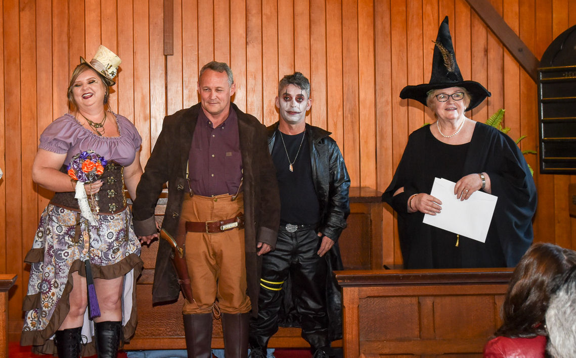 Photograph by
                          Edge Photography GC; Jennifer Cram Celebranat
                          as Minerva McGonagall at a cosplay wedding