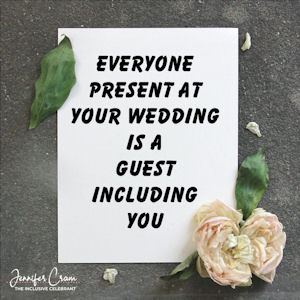 Whiteboard sign on chalkboard background
                        with a pink peony in the foreground. Sign reads
                        Everyone present at your wedding is a guest
                        inclusing you