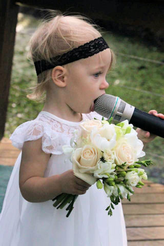 Flower Girl with a microphone