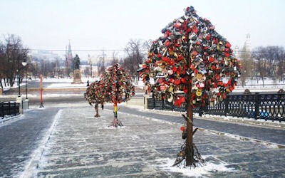 Metal love lock trees on
                      the Lushkov Bridge, Moscow