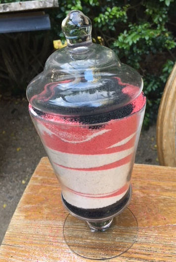 Jar of coloured sand for
                    Sand Ceremony