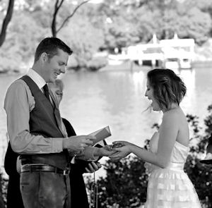 Couple exchanging wedding vows on the
                          banks of the Brisbane River