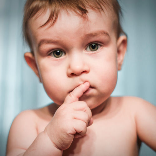 Six good reasons to hold a naming ceremony
                      photo of baby looking puzzled with finger to lips