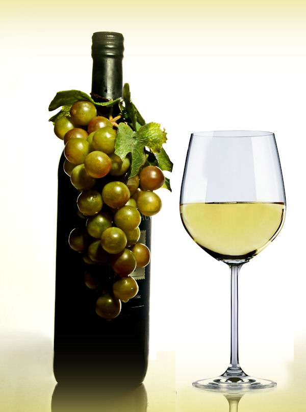 Bottle of wine with
                    grapes and a glass of white wine
