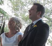 Emily and Damien enjoying a light-hearted
                    moment in their surprise wedding ceremony conducted
                    by Jennifer Cram, Brisbane Celebrant