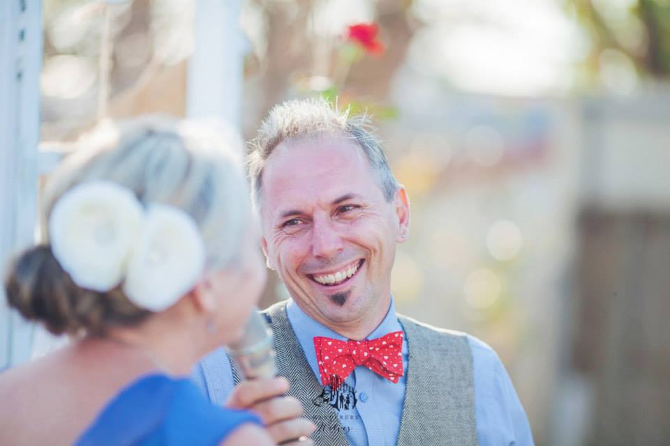 Holly and Neil exchanging personal vows
                        at their vintage backyard wedding officiated by
                        Jennifer Cram, Brisbane Marriage Celebrant.
                        Photography by The Wanderers and The Wolves