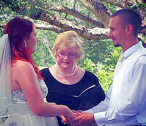 Jordan and Darryl making their
                      vows with Jennifer Cram Brisbane Marriage
                      Celebrant