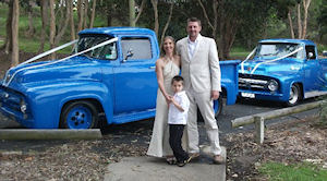 Amanda and William with their bridal
                    cars