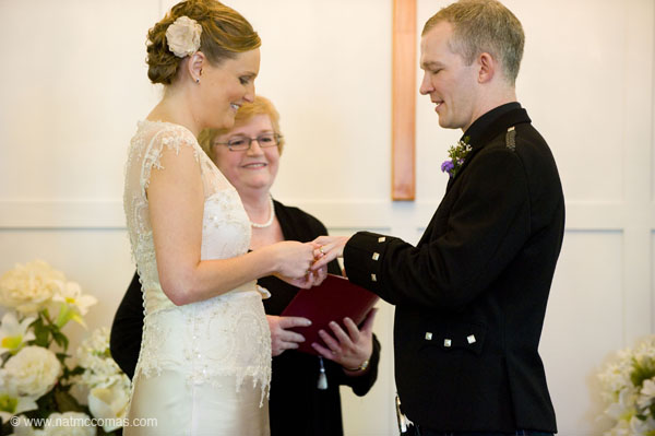 Rowan and Michael exchanging rings at their
                      Scottish themed wedding officiated by Jennifer
                      Cram